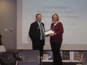 Cheryl Hardy with Brooklyn Reformed Church received her membership plaque at our luncheon on 9-11-14. David Hill (Dollar Bank) is shown presenting the plaque.